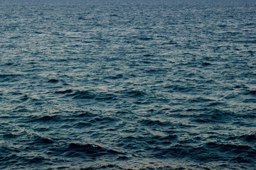 Background shot of aqua sea water surface with waves