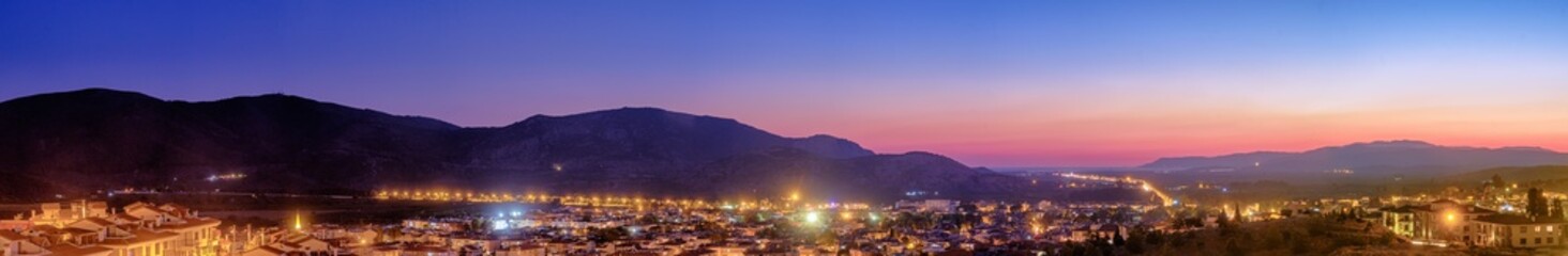 Selcuk, Turkey. Panorama of the view of the city and the mountains at sunset.