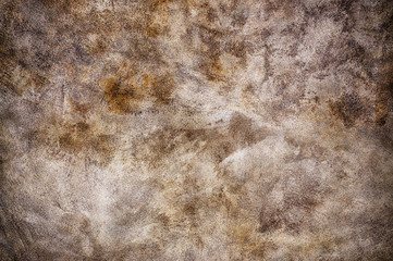 Old wall in earth colors and strokes pattern.