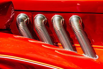 Pipes of a red sports car