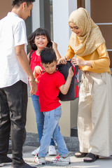 Fototapeta premium boy and girl wearing backpack