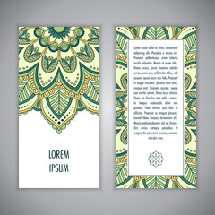 Greeting card or Invitation template with ethnic mandala ornament. Hand drawn vector illustration