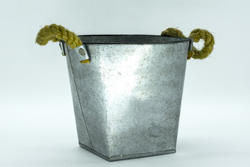 Steel bucket vase isolated