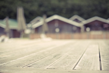 Defocus Rustic landscape wooden houses hill forest sky.