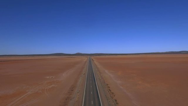 Aerial Footage of A Highway Road through the Australian Desert