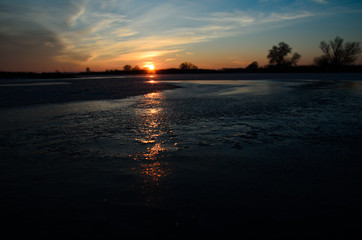 Beautiful winter sunset on river Dnieper