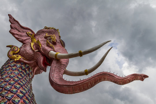 Amazing Elephant Divinity and Himmapan Mythical Creature with dramatic sky at Wat Bandensali buddhist temple in Thailand