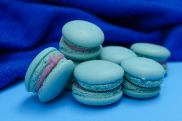 Close up of blue macaroon sweet dessert food