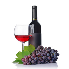 Red wine bottle with empty black label and glass for tasting with fresh grape