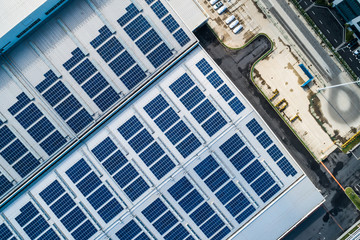 aerial view of factory roof with solar panels