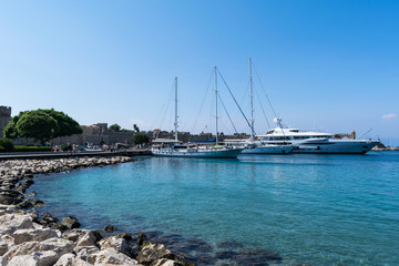 Fototapeta na wymiar Yachts in a greek harbor