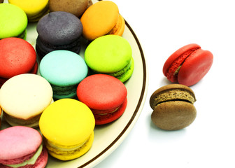 multicolor mini french macaroons cookie on white backgrounds