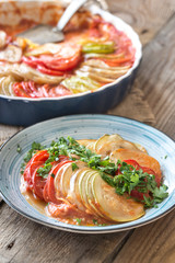 Dish of ratatouille on the wooden table