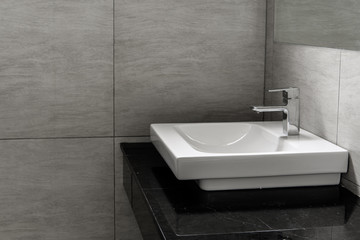 Bathroom interior with sink and faucet
