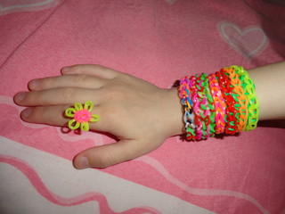 hands, children's handicrafts made of rubber bands