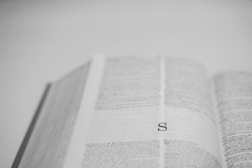 Roman A to Z alphabet printed on open book