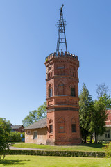 Obraz premium BIRINI, LATVIA - MAY 21, 2017: Vintage red brick tower.