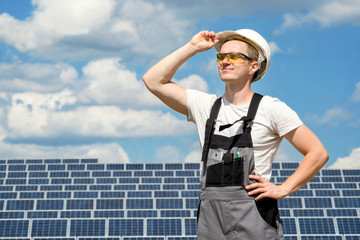 Solar panels engineer in white cask