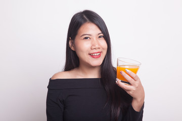 Young Asian woman drink orange juice.