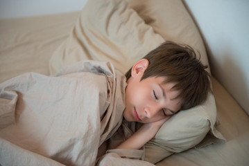 Adorable boy sleeping at home. Healthy child sleep. Sweet dreams