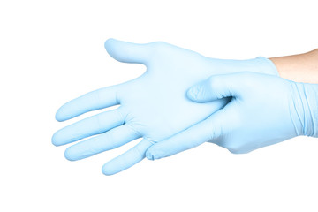 Doctor putting on blue sterilised medical glove for making operation