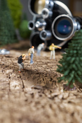 Miniature people photograpehr : shooting  a Retro, old, vintage and classic film camera
