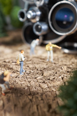 Miniature people photograpehr : shooting  a Retro, old, vintage and classic film camera