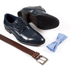 Set of male stylish clothes on white background, leather belt, shoes and bow tie
