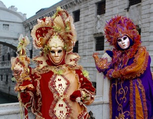 Fototapeta na wymiar Venice Carnivale masked party-goers