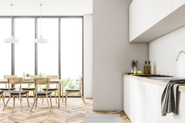 Modern white loft dining room and kitchen