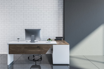 White brick and gray manager workplace interior