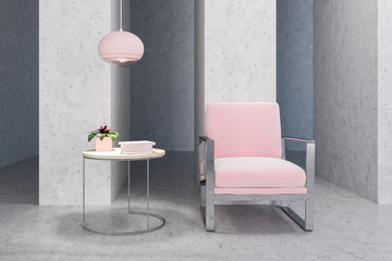 Pink armchair in empty concrete living room, table