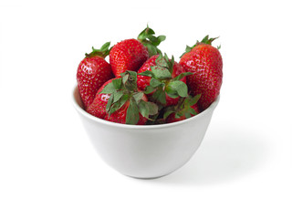 White bowl with mature strawberries