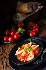 rustic Delicious Pasta - Ravioli in tomato sauce with basil