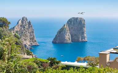 Famous Faraglioni rocks are near Capri island, Italy