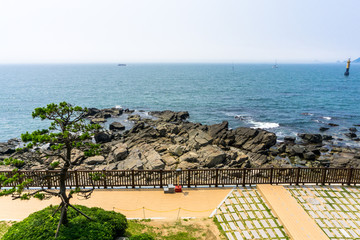 Rock beach on Haeundae Dongbaekseom Island , Busan South Korea.