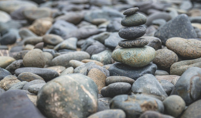 Fototapeta na wymiar stack of pebble stones or zen stones background