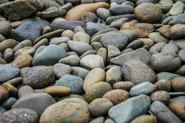 Black pebbles stone background 