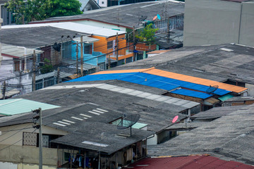 Crowded tenement houses or town houses in Bangkok city, Thailand.