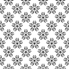 Black floral pattern on white seamless background