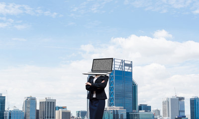 Business woman with laptop instead of head.