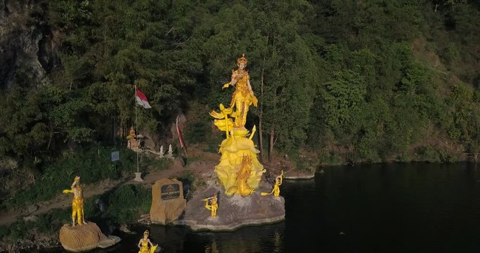 Golden statue Pura Ulun Danu Bangli at Batur Lake,near east caldera Batur volcano,Bali island,Indonesia