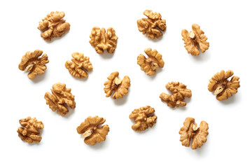 Walnut kernels isolated on white background. Top view.