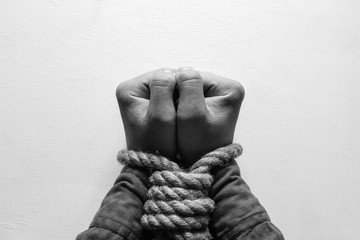 bound hands. stop human trafficking
