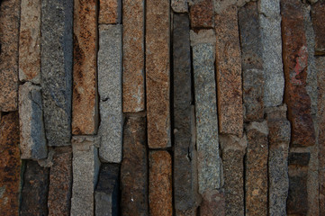 vertical texture of multi-colored stones