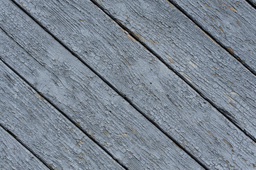 Painted in light blue color old wooden long boards