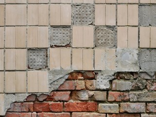 olonne / Ukraine - 06 August 2018: old brick wall with a tiled top
