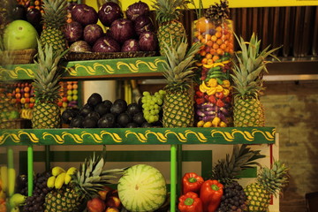 variety of tropical fruits on show window