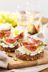 Toasts with fresh cheese and figs