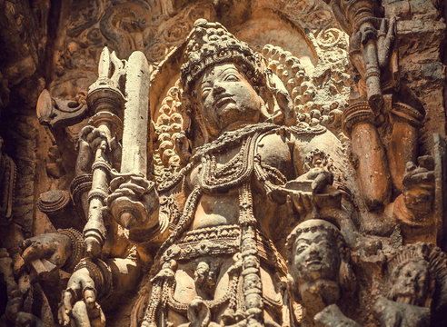 Sword of Shiva Lord on stone carved relief of the 12th century South Indian temple. Halebidu heritage, India